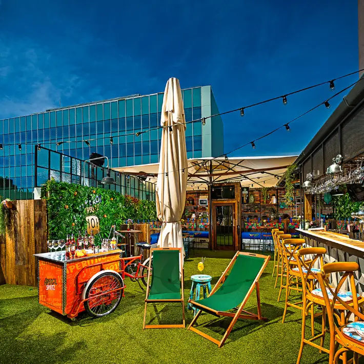 Outdoor rooftop beer garden at 101 Limerick with private bar area for summer corporate events and team celebrations.