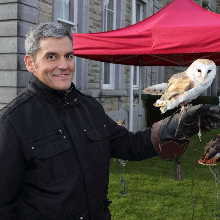 man holding falcon