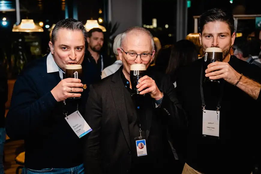 Three men drinking Irelands home drink of Guinness and a corporate run event after a day of meetings and events | County Kerry