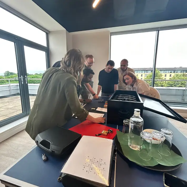 Team cracking codes on box 5 