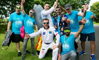 Corporate team enjoying the Space Survival team building activity in Ireland, wearing fun space costumes and laughing together during an outdoor GPS treasure hunt organised by Dynamic Events.