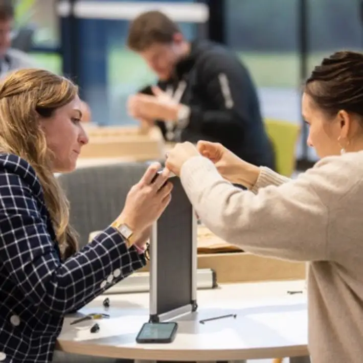 2 people creating the light