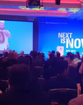 man playing bodhran on stage