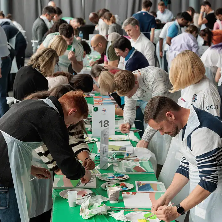 group doing big picture team building activity