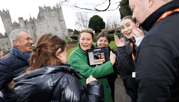 people looking at ipad on scavenger hut event